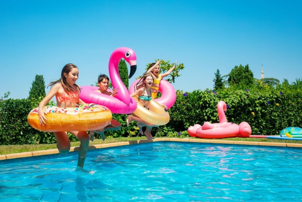 Family relaxing at an all-inclusive resort pool on a stress-free vacation